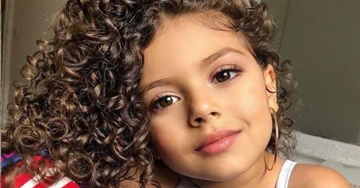 Immerse yourself in the irresistible charm of curly-haired babies.