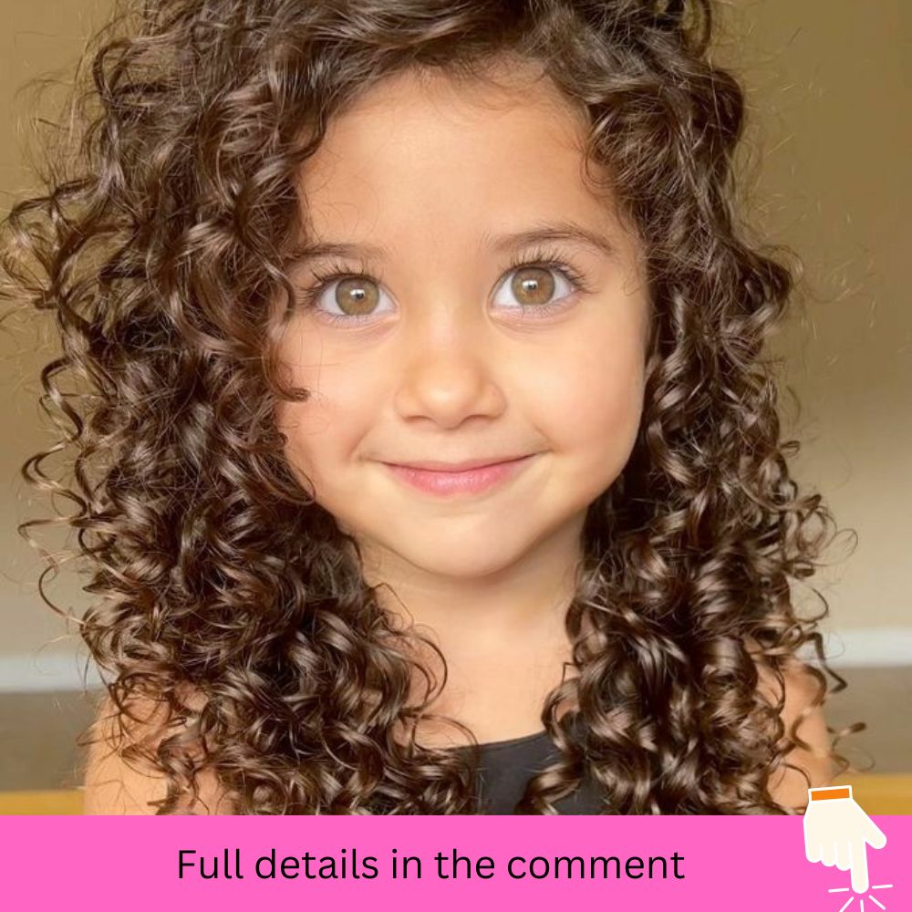 A Sweet Honey-Haired Child with Adorable Curls.